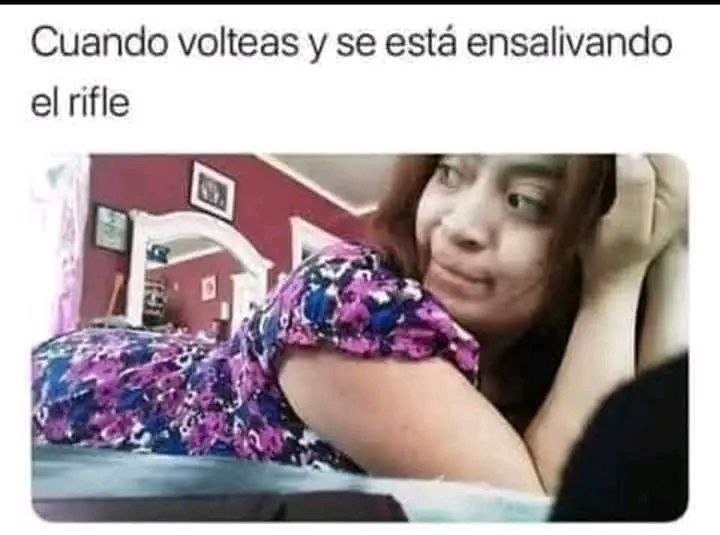 a woman is laying down on a bed